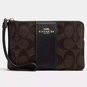 Coach corner zip wristlet in signature canvas